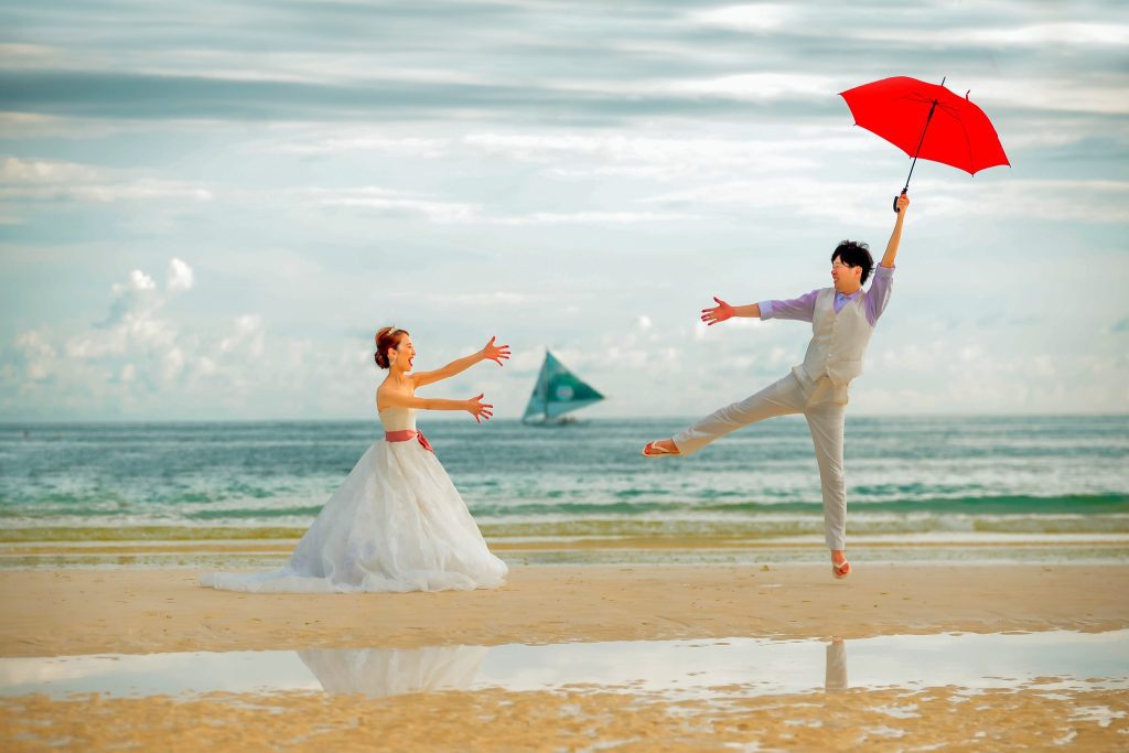 Couple with red umbrella